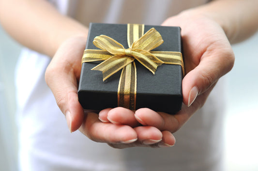 20 Thoughtful Corporate Gift Ideas Under $100* (That They'll Actually Use)